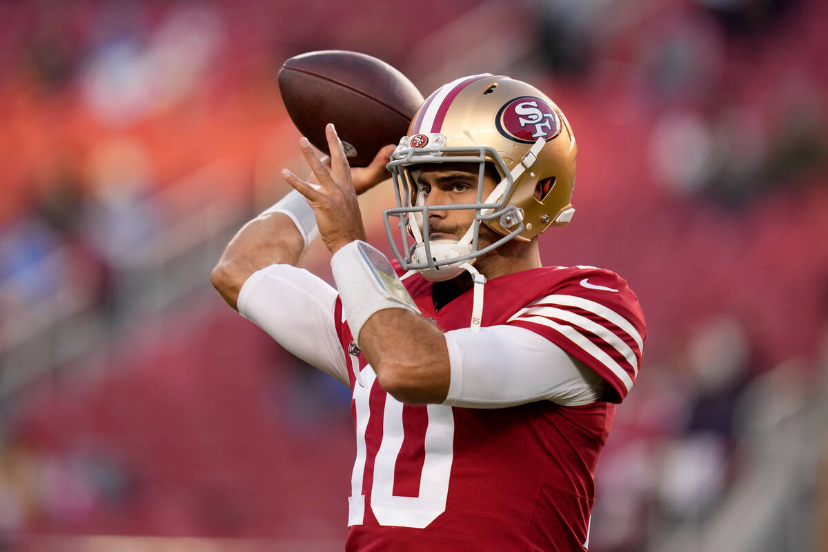 San Francisco 49ers quarterback Jimmy Garoppolo (10) warms up before an NFL football game again ...