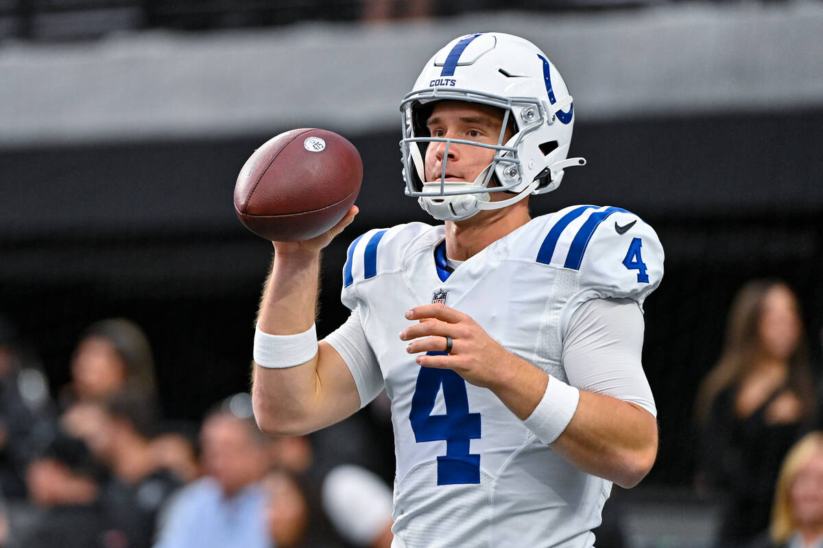 Indianapolis Colts quarterback Sam Ehlinger (4) warms up before an NFL football game against th ...