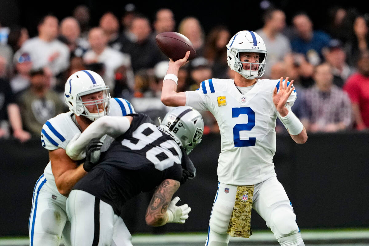 Indianapolis Colts quarterback Matt Ryan (2) throws against the Las Vegas Raiders in the first ...