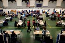Chester County, Pa., election workers check mail-in and absentee ballots for the 2020 General E ...