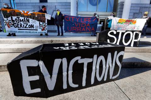 In this Jan. 13, 2021, file photo, tenants' rights advocates demonstrate in front of the Edward ...