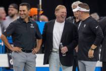 Raiders general manager Dave Ziegler, left, owner Mark Davis, center, and head coach Josh McDan ...