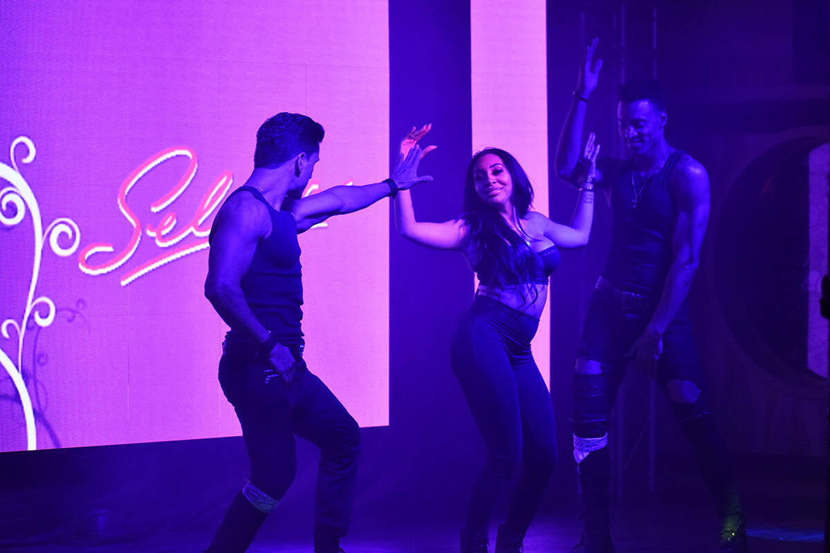Dancers Mila Schütz, Antonio Granda and Roberto Alejandro perform at the "Selena Forever" conc ...
