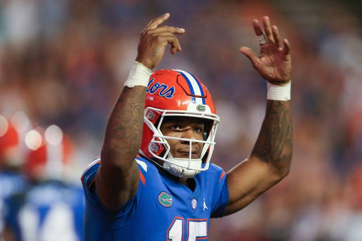 Florida quarterback Anthony Richardson (15) celebrates after a touchdown against South Carolina ...