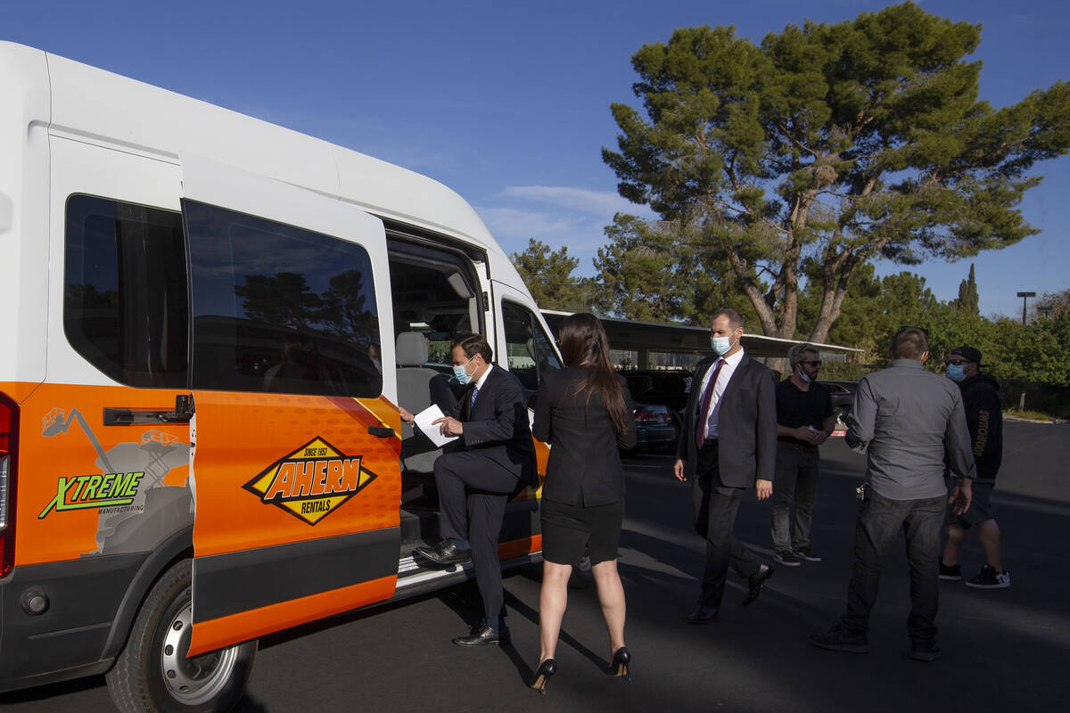 Adam Laxalt leaves a press conference in an Ahern Rentals van outside the Nevada Republican Par ...
