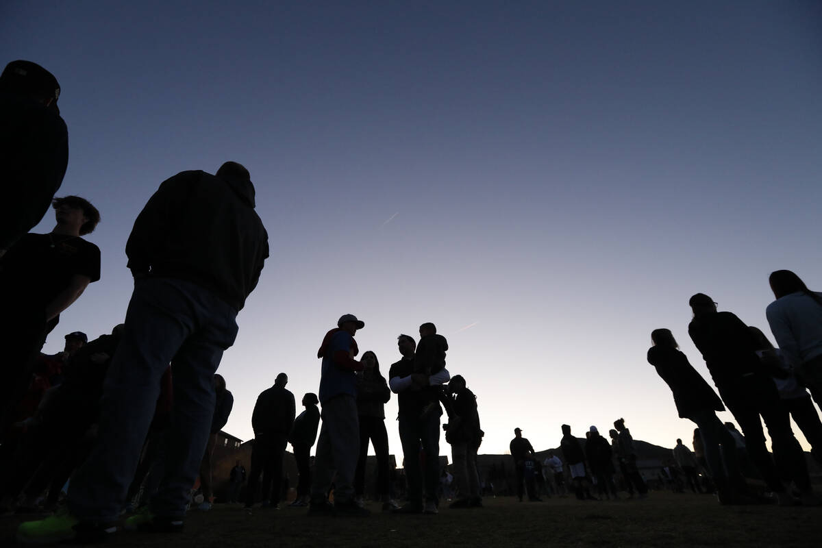 People gather for a remembrance ceremony of Rex Patchett, Friday, March 11, 2022, at Paradise ...