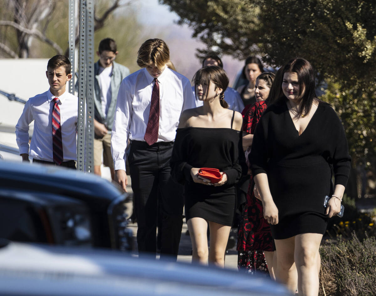 Mourners arrive at the Church of Jesus Christ of Latter-day Saints to attend Rex Patchett&#x201 ...