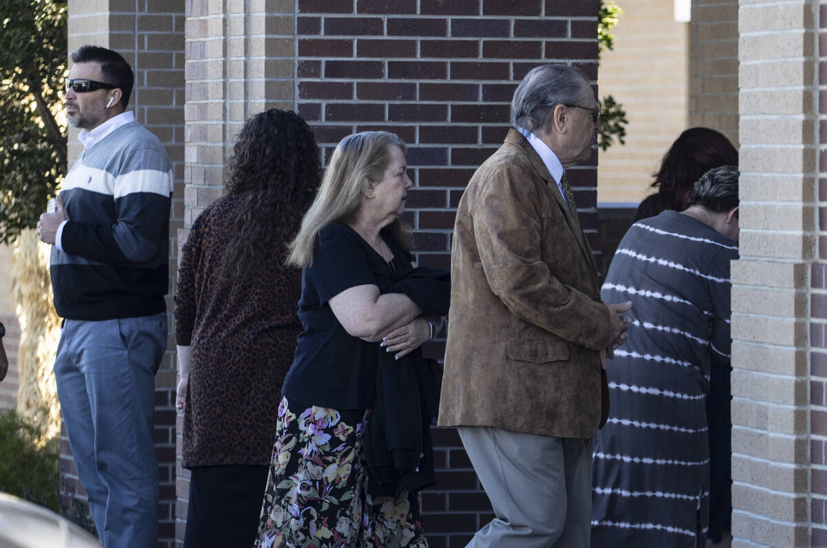 Mourners arrive at the Church of Jesus Christ of Latter-day Saints to attend Rex Patchett&#x201 ...