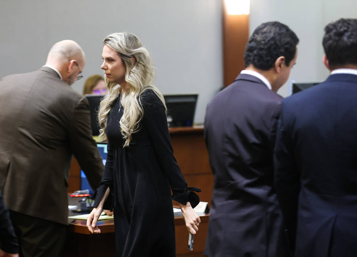 Meaghan Price, step daughter of victim Randy Reiner, walks away after reading her victim impact ...