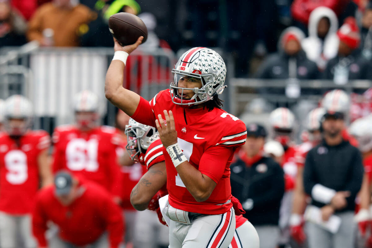 Ohio State quarterback C.J. Stroud passes against Indiana during an NCAA college football game ...