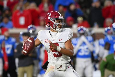 Alabama quarterback Bryce Young (9) looks to pass during the second half of an NCAA college foo ...
