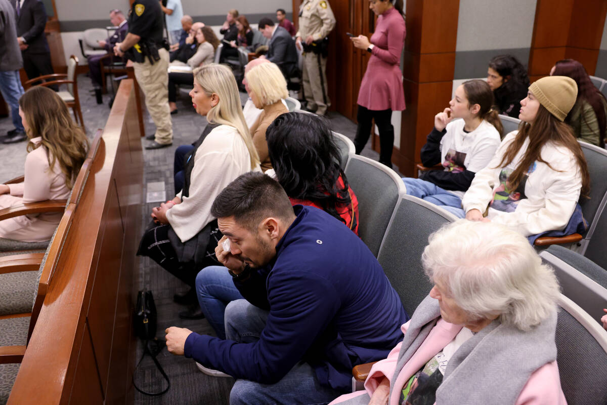 Michael Velasco, godfather of 7-year-old Liam Husted, wipes tears during a sentencing hearing f ...