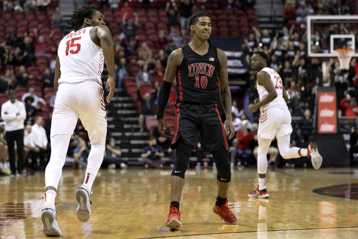 UNLV Rebels guard Keshon Gilbert (10) celebrates after scoring a three-pointer while Dayton Fly ...