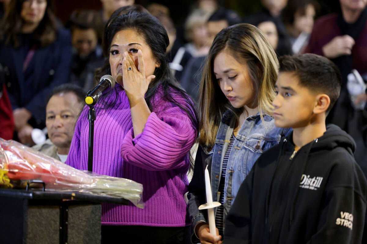 Minddie Lloyd, widow of Las Vegas police Lt. Erik Lloyd, speaks alongside Stephanie Magno Lloyd ...