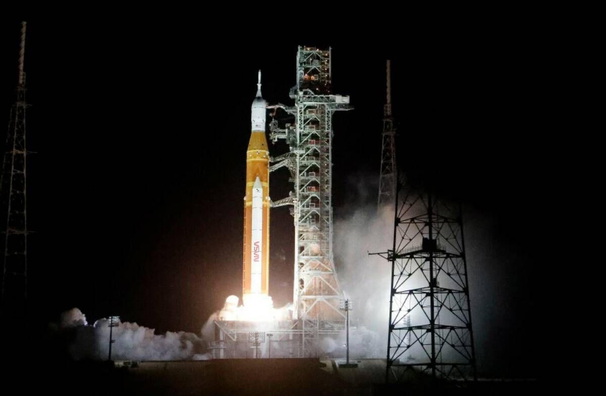 NASA's new moon rocket lifts off from Kennedy Space Center's Launch Pad 39-B Wednesday, Nov. 16 ...