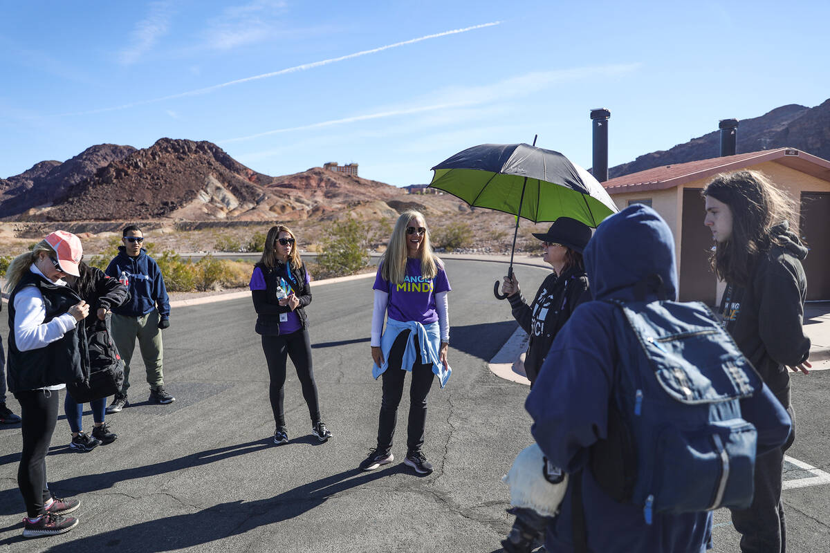 Emilia Gross, a teacher with Nevada Connections Academy, center, addresses students and their p ...