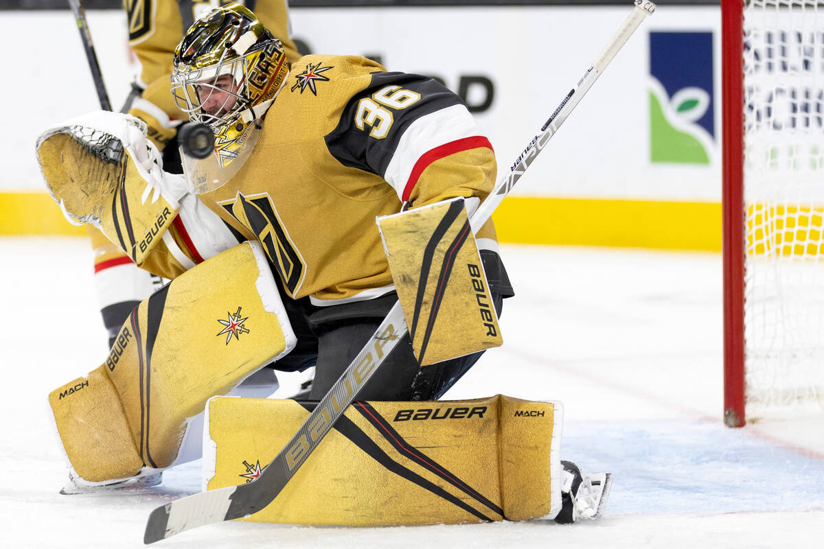 Golden Knights goaltender Logan Thompson (36) saves a shot on goal during the second period of ...