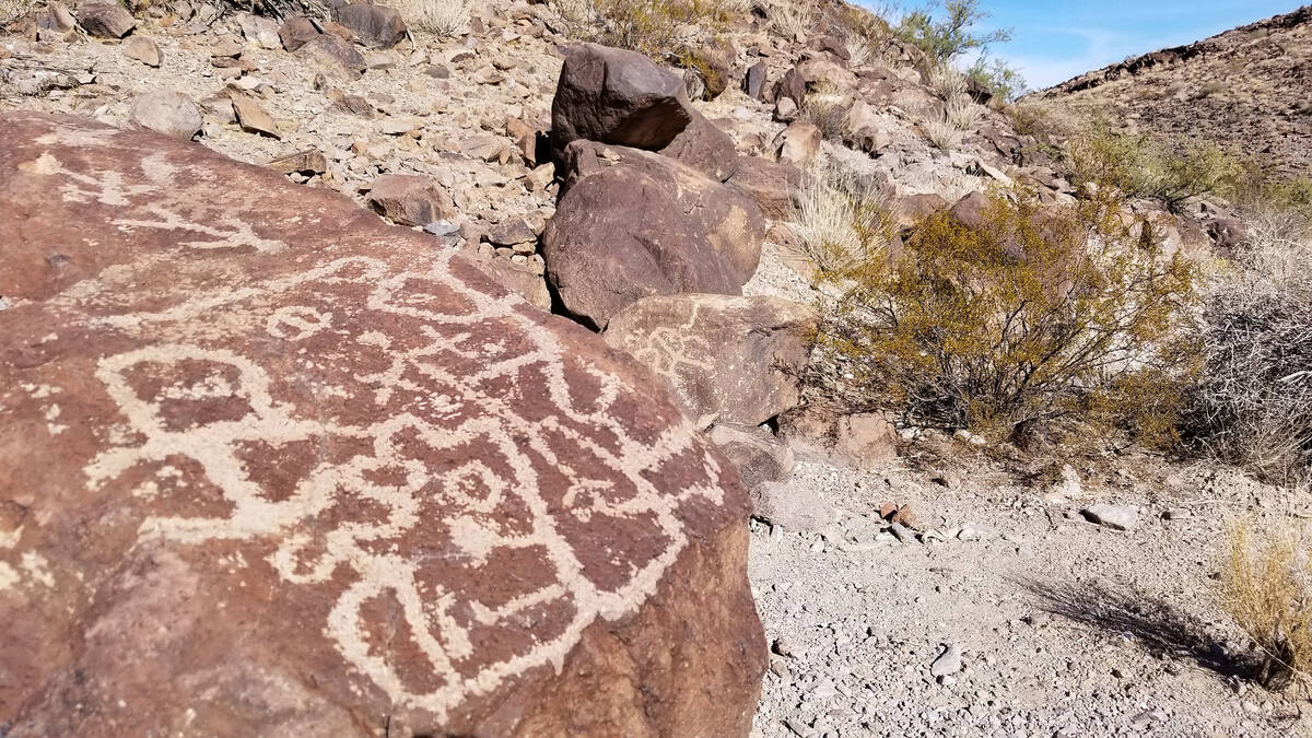 Petroglyph Canyon is accessible to anyone willing to take a 4-mile hike in Sloan Canyon Nationa ...