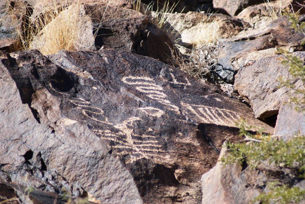 Petroglyph Canyon is accessible to anyone willing to take a 4-mile hike in Sloan Canyon Nationa ...