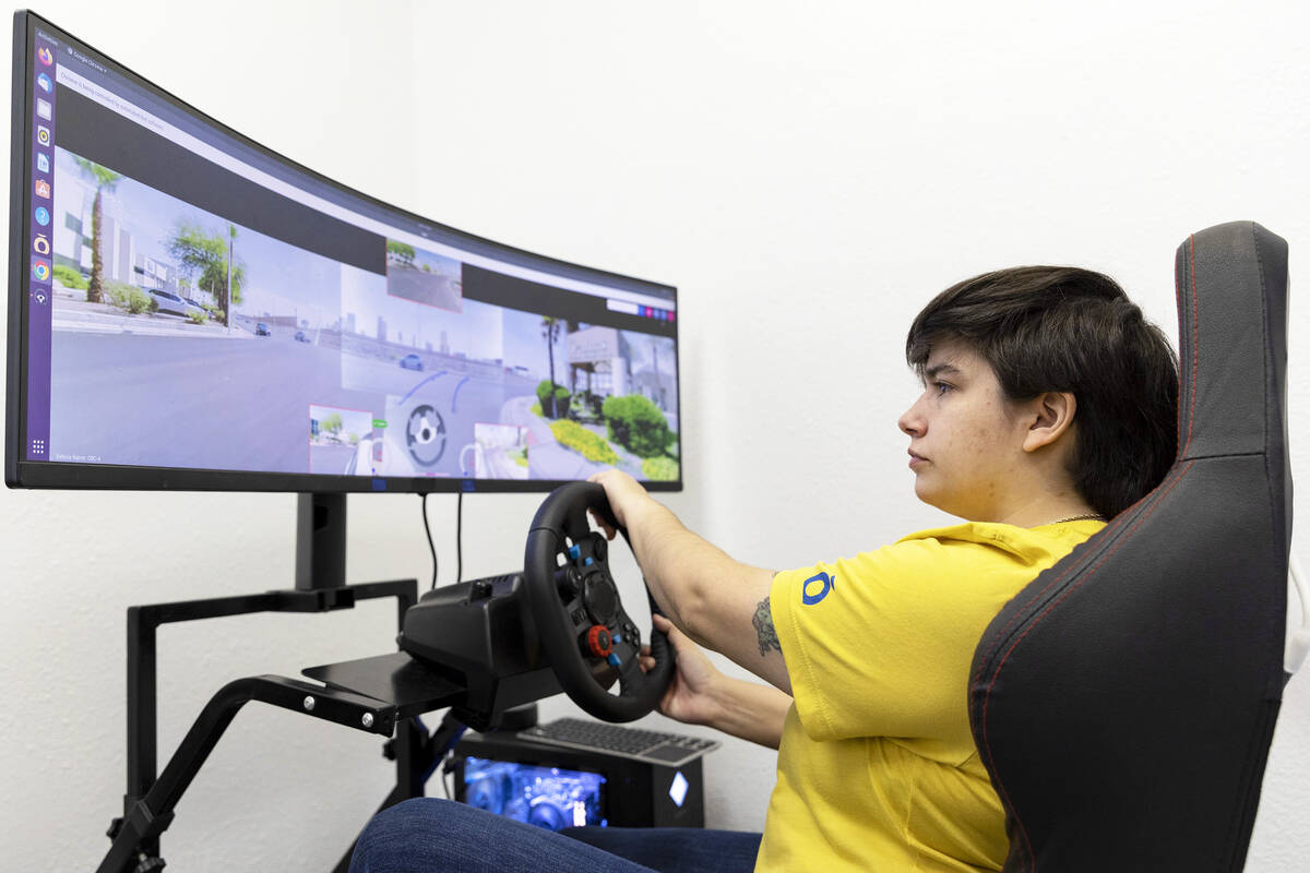 Remote car pilot Antonella Siracusa-Rosa demonstrates driving a Halo.Car at the startup’s off ...