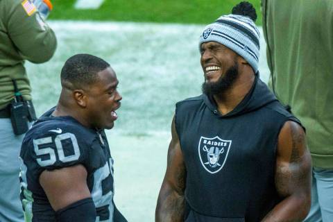 Raiders linebacker Jayon Brown (50) talks about his fumble recovery with teammate linebacker De ...