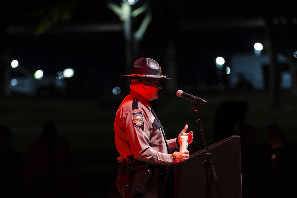 Kevin Honea, deputy chief at Nevada State Police Highway Patrol, speaks during a ceremony honor ...