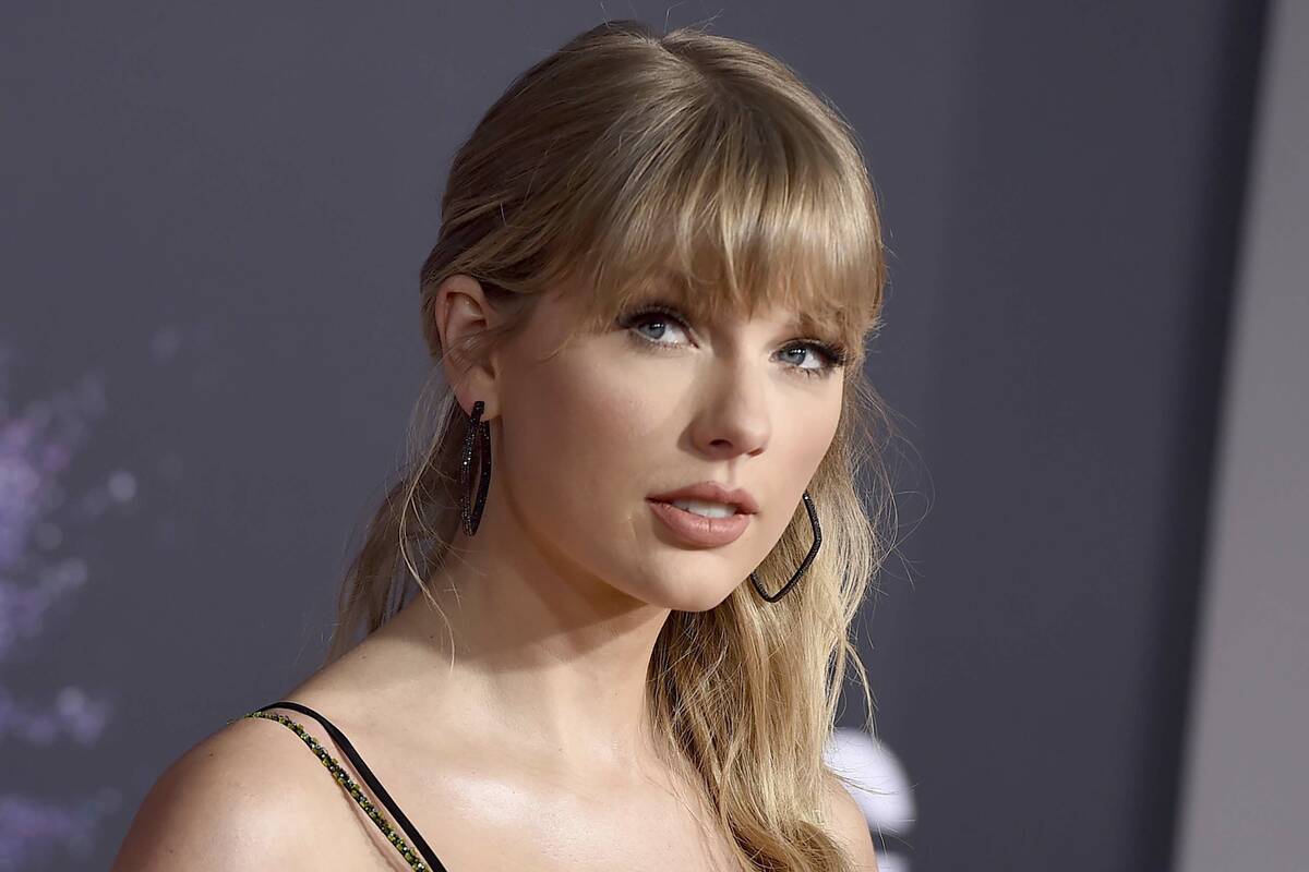 FILE - This Nov. 24, 2019 file photo shows Taylor Swift at the American Music Awards in Los Ang ...