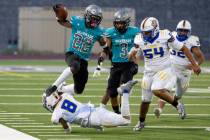 Silverado senior Caden Harris (22) runs the balls during their game against Sierra Vista at Sil ...