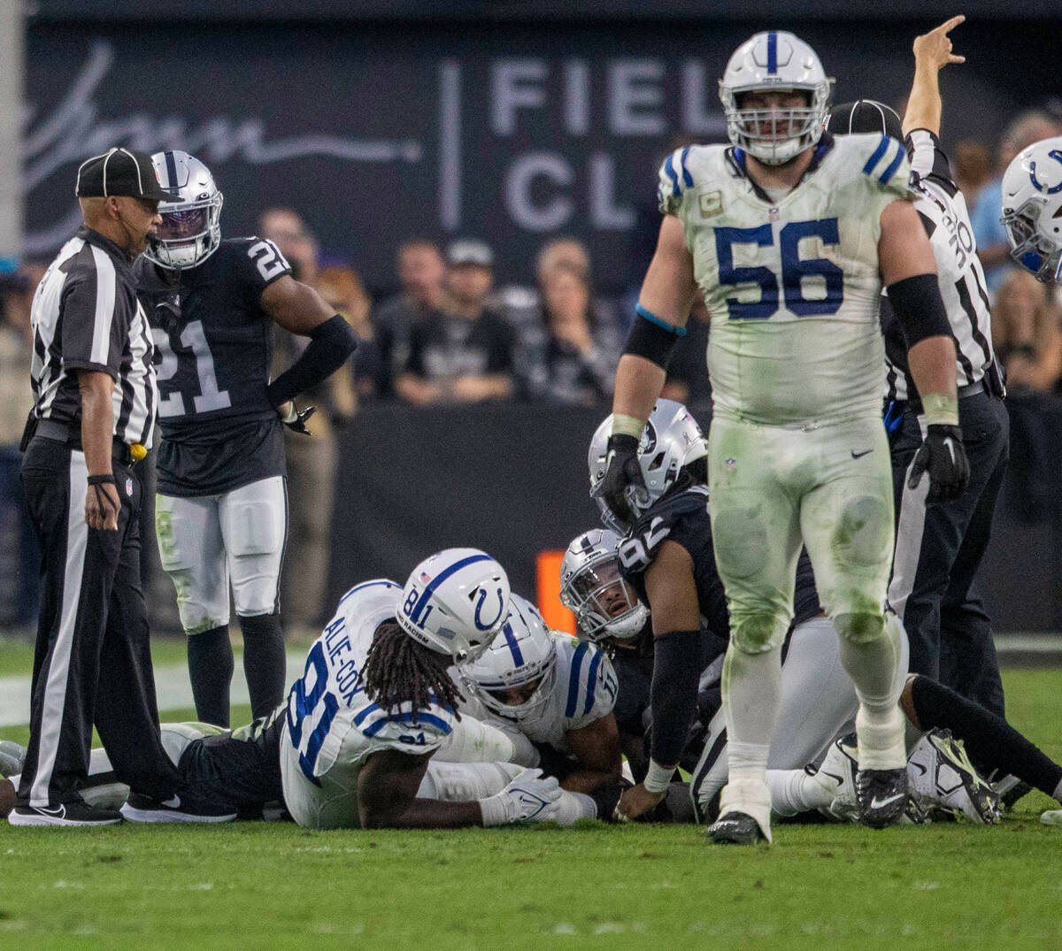 Raiders cornerback Amik Robertson (21) looks on as Indianapolis Colts wide receiver Michael Pit ...
