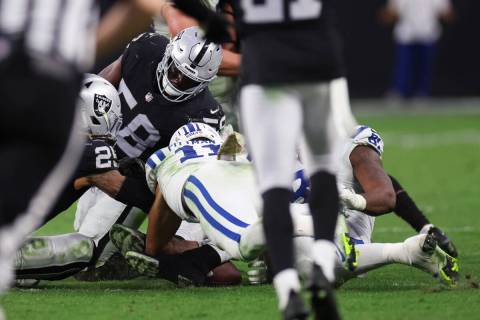 Raiders linebacker Darien Butler (58) attempts to recover a fumble by Indianapolis Colts wide r ...