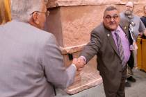 Ed Uehling shakes the hand of Clark County Registrar of Voters Joe Gloria after a Clark County ...