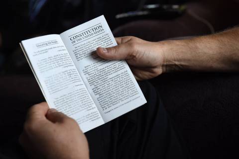 BJ Soper looks at a copy of the U.S. Constitution. (Washington Post photo by Matt McClain)