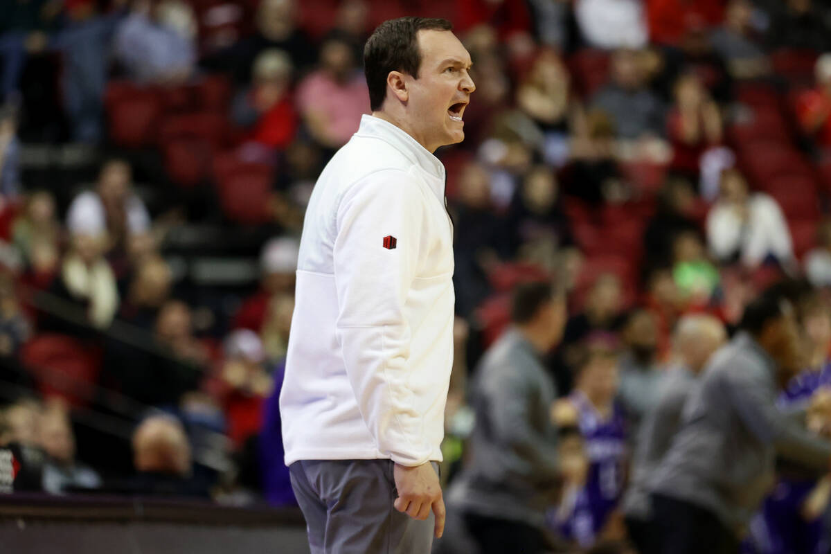UNLV Rebels head coach Kevin Kruger gives directions to his players during the second half of a ...