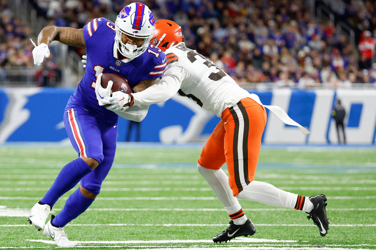 Buffalo Bills wide receiver Gabe Davis (13) is tackled by Cleveland Browns cornerback A.J. Gree ...