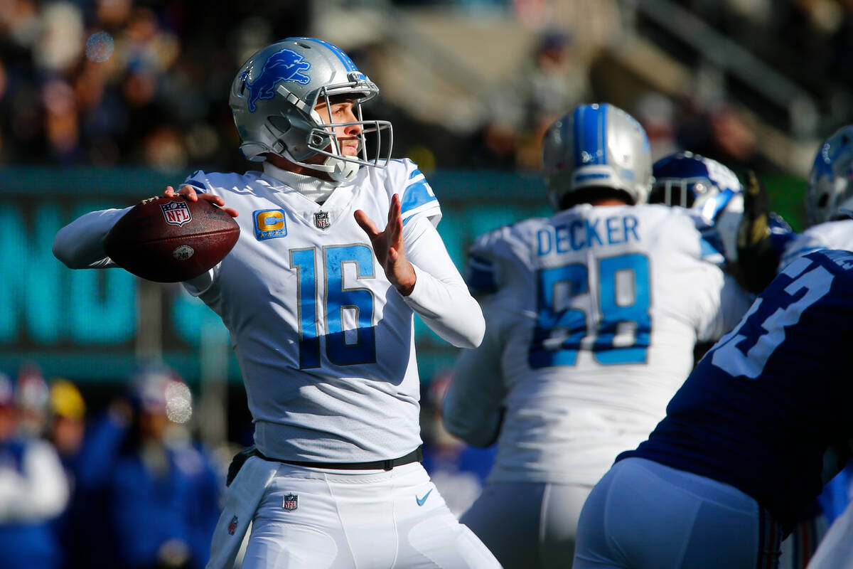 Detroit Lions quarterback Jared Goff (16) passes during the first half of an NFL football game ...