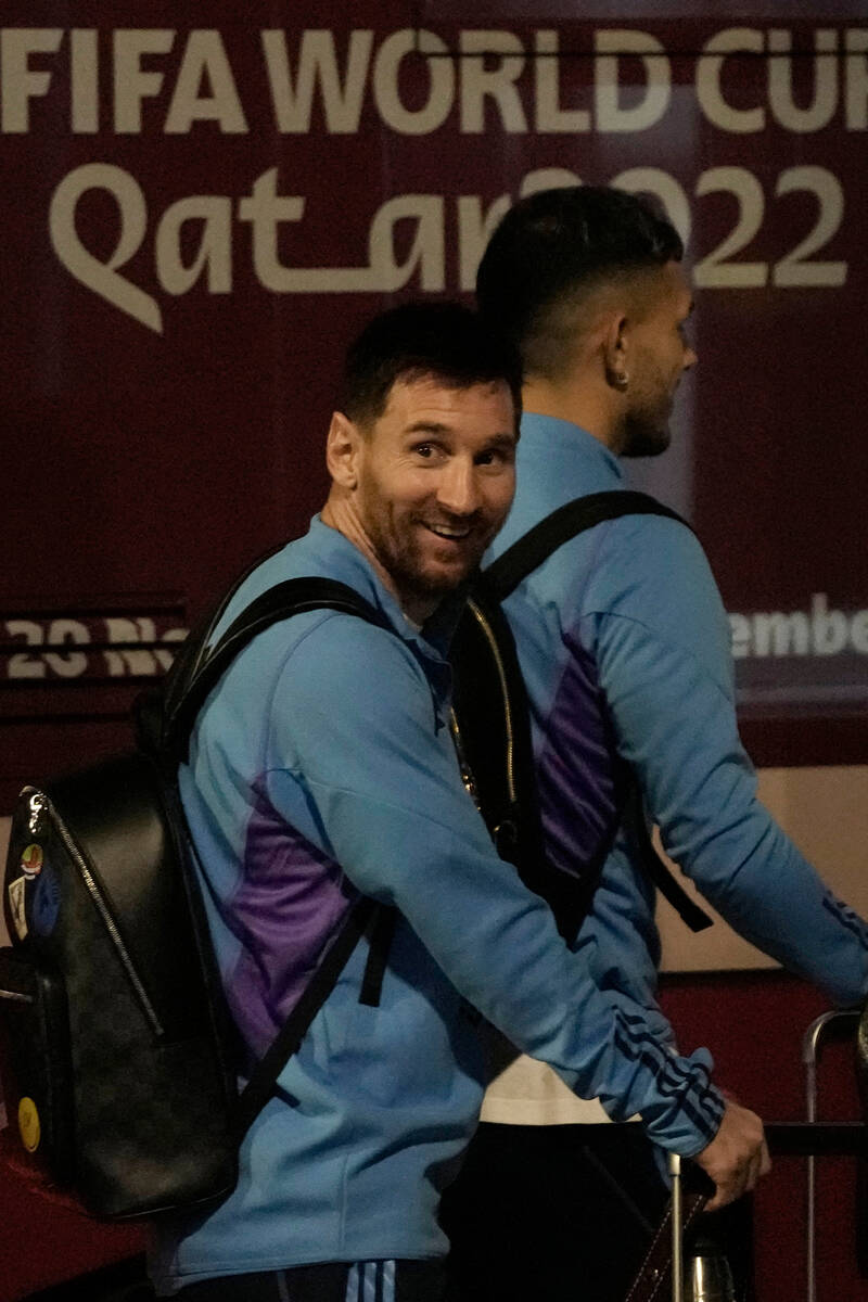 Lionel Messi of Argentina's national soccer team arrives with teammates at Hamad International ...