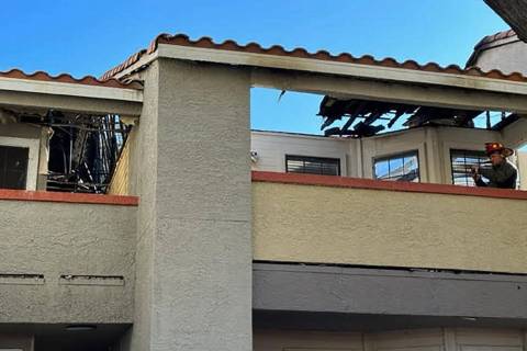 Sections of the roof are missing after a morning fire at Bella Solana Apartment Homes at 7101 S ...