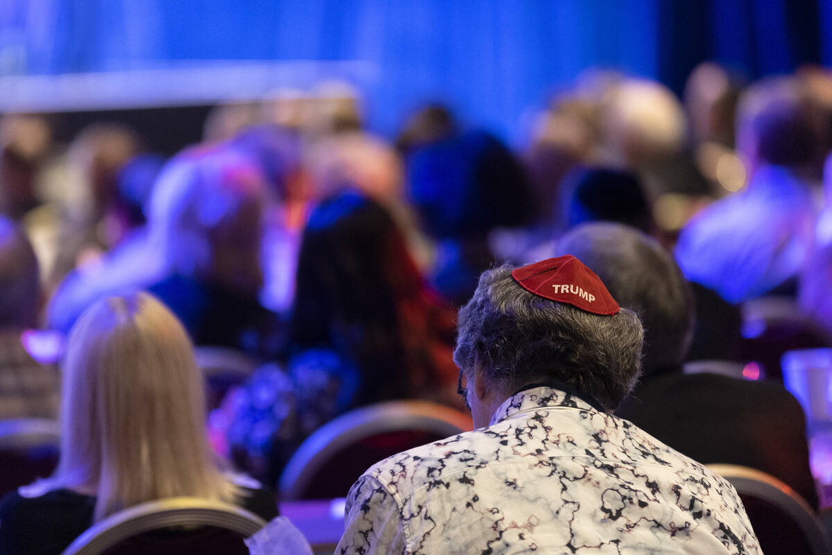 Audience members, one wearing a Trump yarmulke, listen to speakers during the annual Republican ...