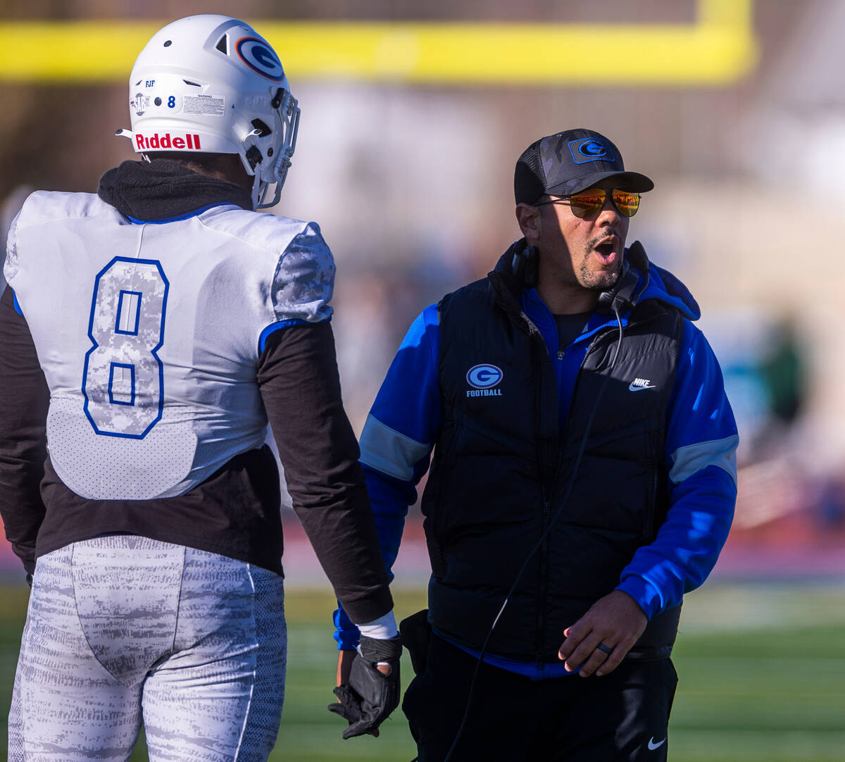 Bishop Gorman head coach Brent Browner yells to his players as DL Jayden House (8) looks on ver ...