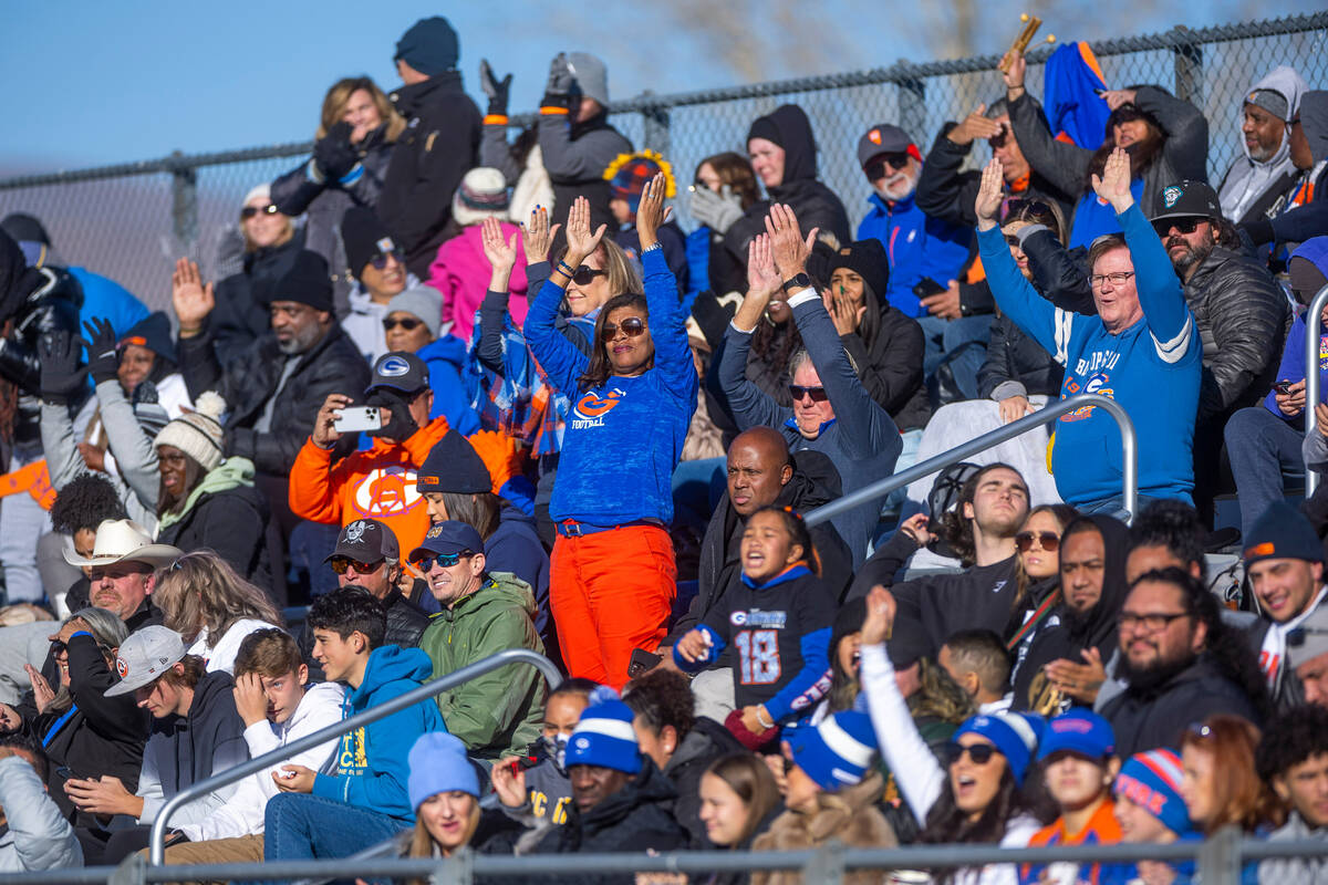 Bishop Gorman fans celebrate another touchdown over Bishop Manogue during the second half of th ...