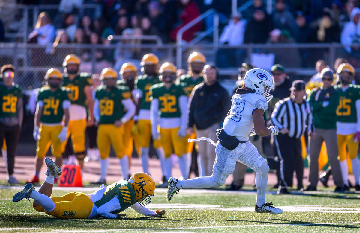 Bishop Gorman RB Micah Kaapana (22) streaks down the sideline for another long touchdown run aw ...