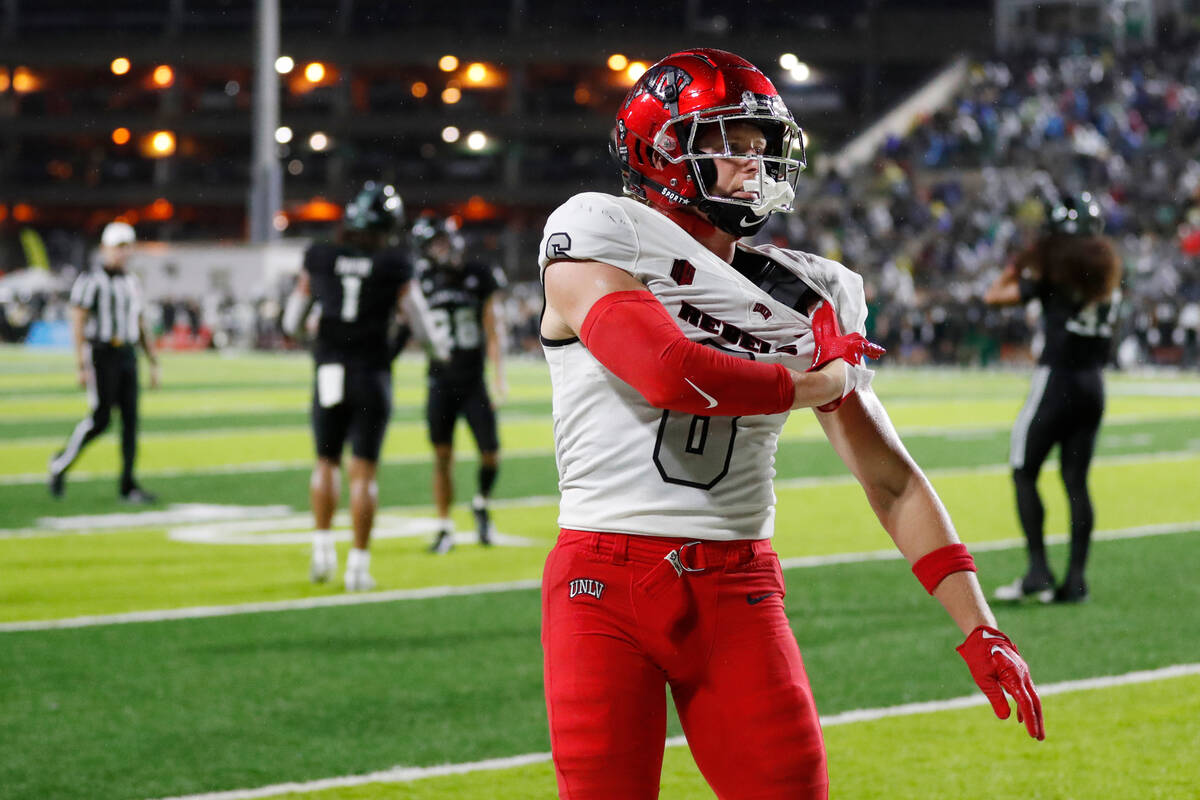 UNLV wide receiver Jeff Weimer (6) reacts after making a touchdown against Hawaii during the fi ...
