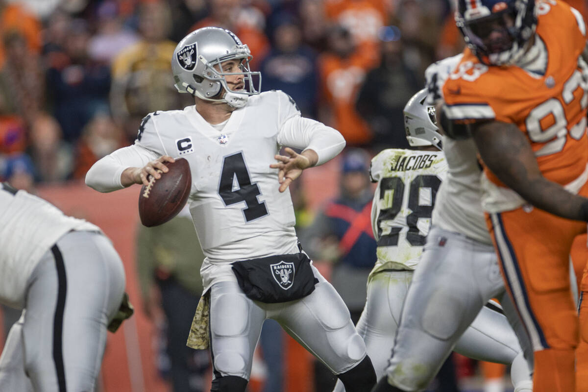 Raiders quarterback Derek Carr (4) throws against the Denver Broncos during the second half of ...
