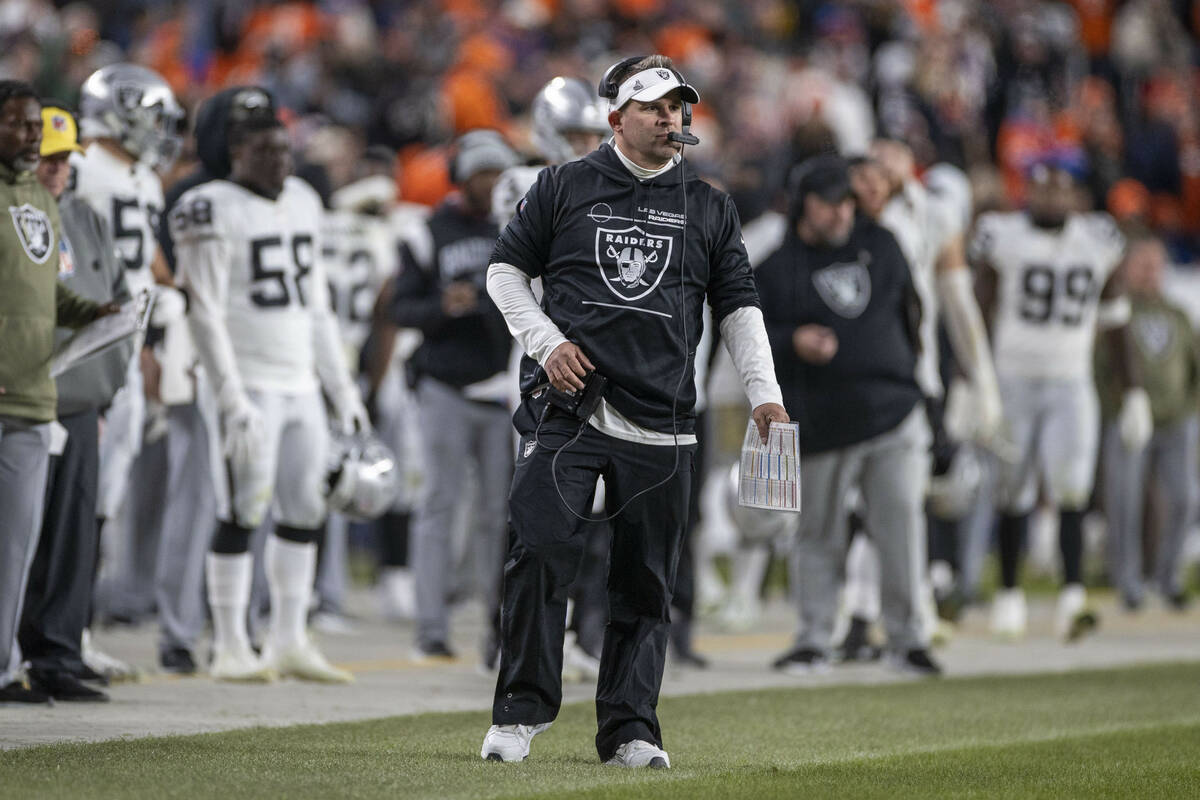 Raiders head coach Josh McDaniels looks on from the sideline during the second half of an NFL g ...