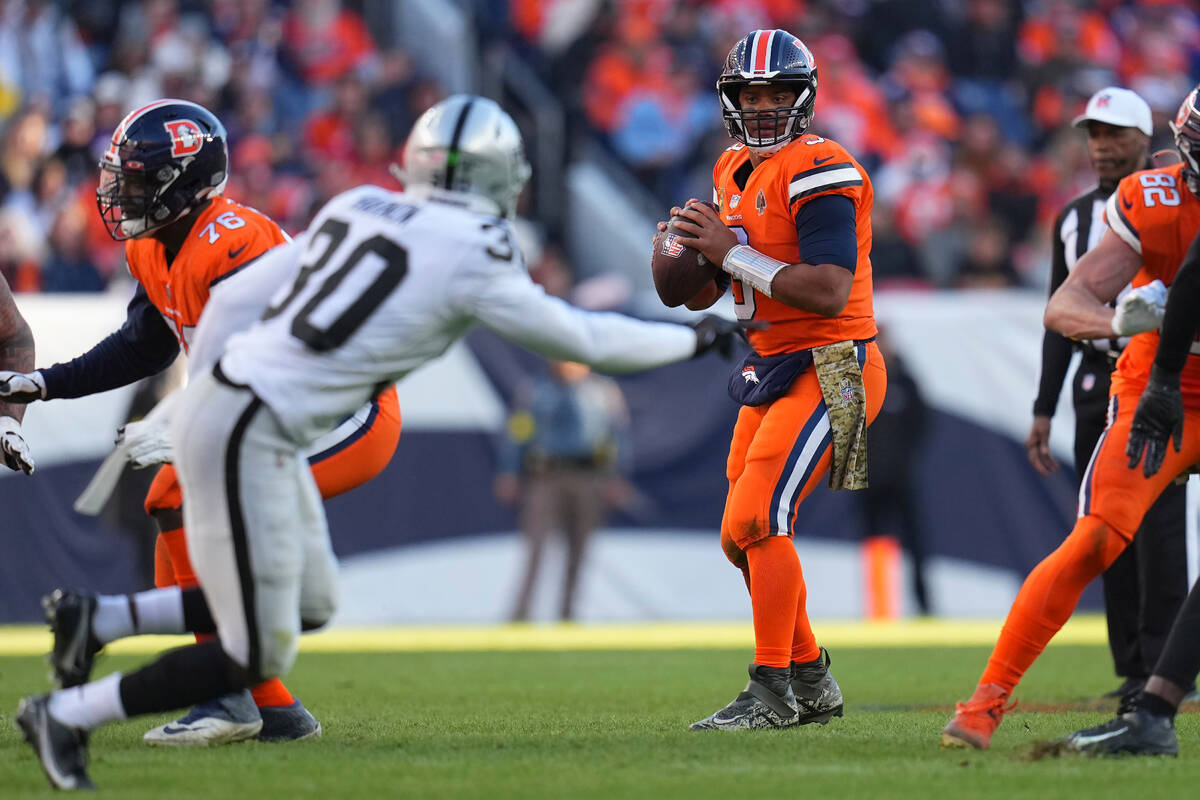 Denver Broncos quarterback Russell Wilson (3) passes against the Las Vegas Raiders during the f ...