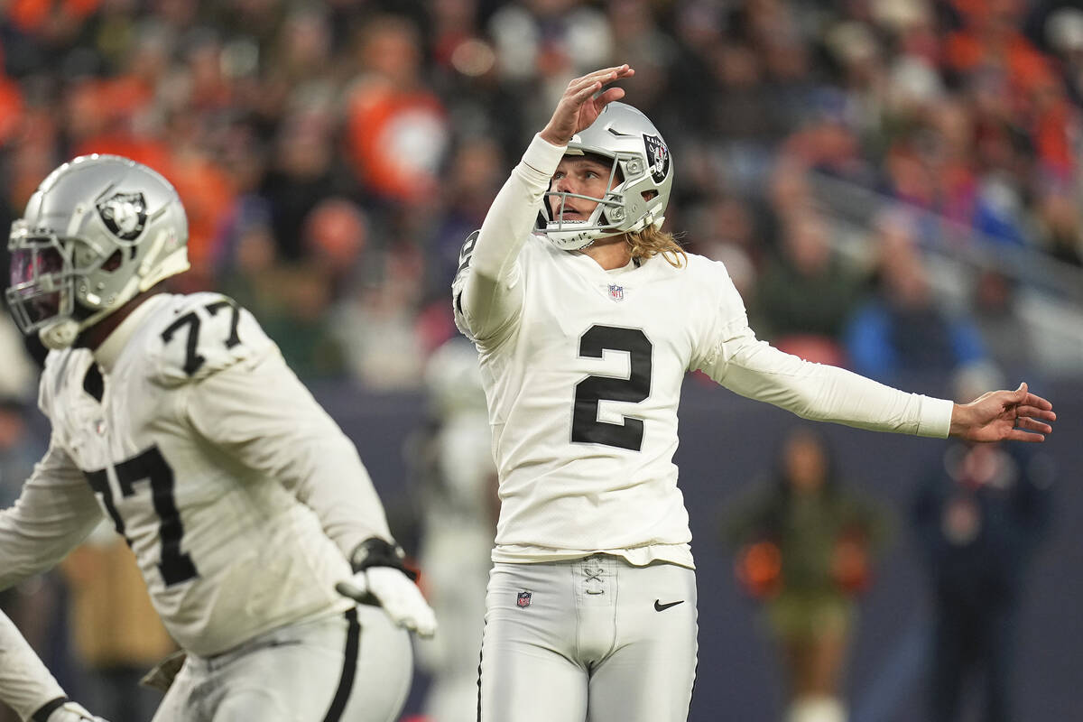 Las Vegas Raiders place kicker Daniel Carlson (2) watches his field goal during the second half ...