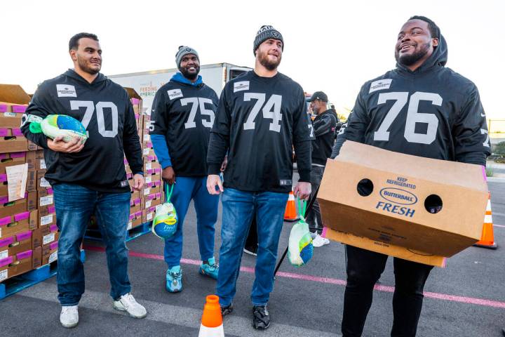 (LtoR) Raiders offensive tackle Sebastian Gutierrez (70), offensive tackle Brandon Parker (75), ...