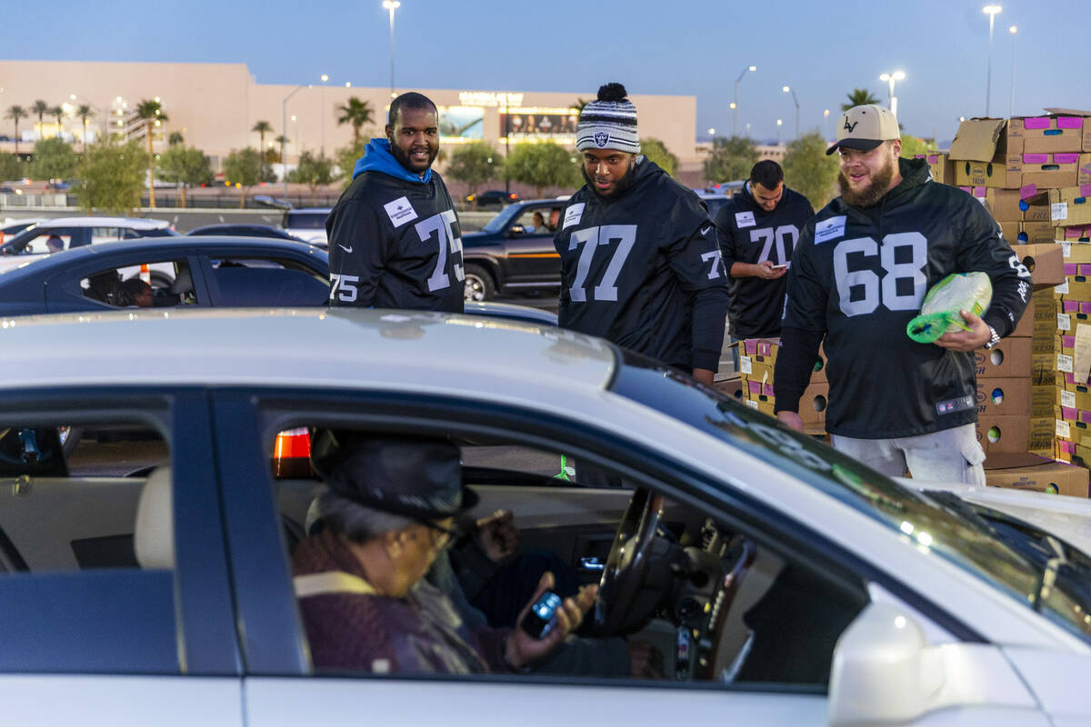 (LtoR) Raiders offensive tackle Brandon Parker (75), offensive tackle Thayer Munford Jr. (77) a ...