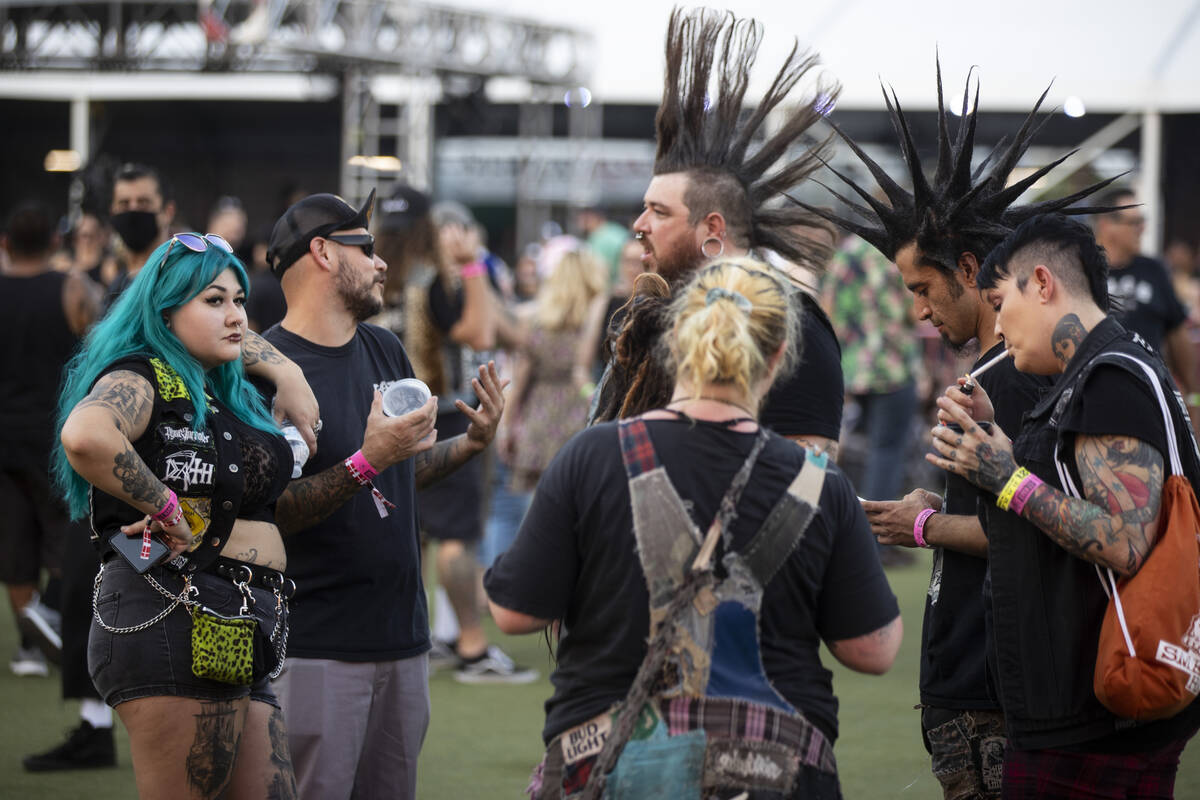 People attend the Punk Rock Bowling music festival at the Downtown Las Vegas Events Center on S ...