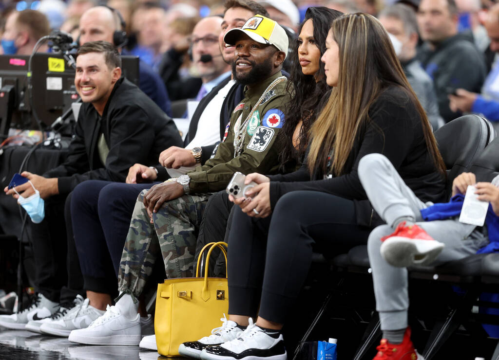 Boxing legend Floyd Mayweather watches as Duke takes on Gonzaga in an NCAA college basketball g ...